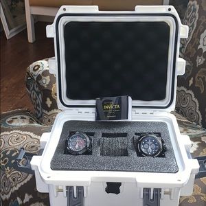 Two Invicta watches